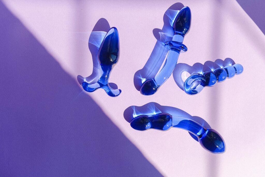 a selection of glass dildos