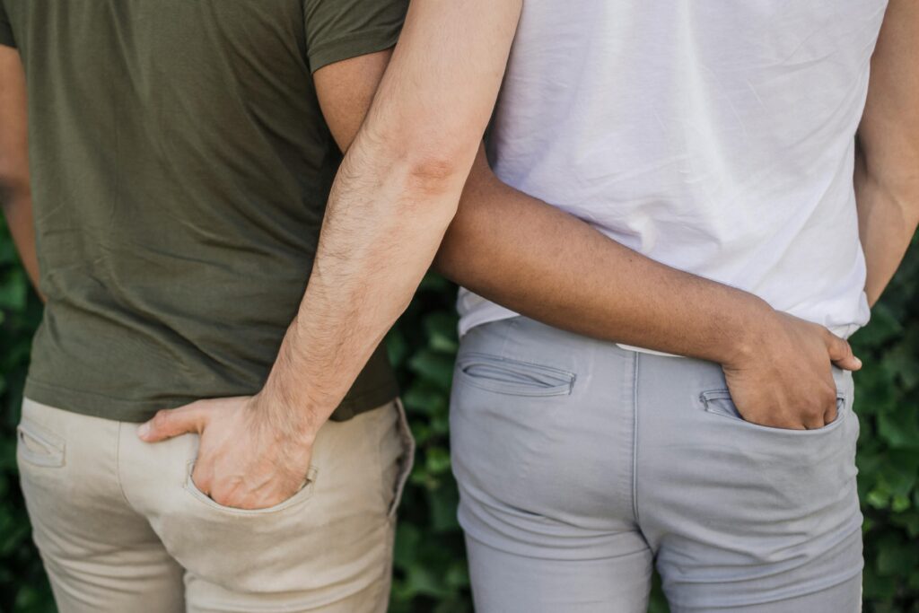 Two men from behind